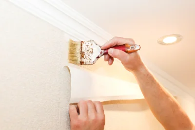 Pose de papier peint à Sendets — revêtements muraux et toiles de verre